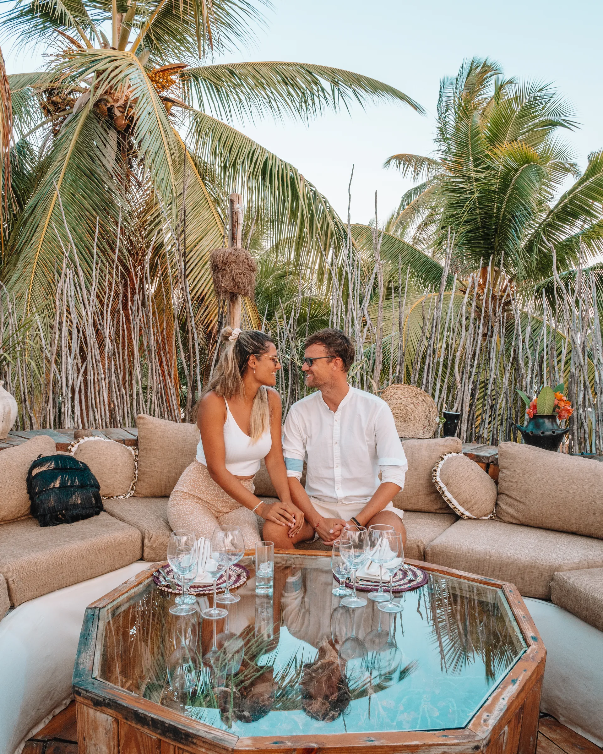Lounge among the palms at The Nest, set for a golden-hour session
