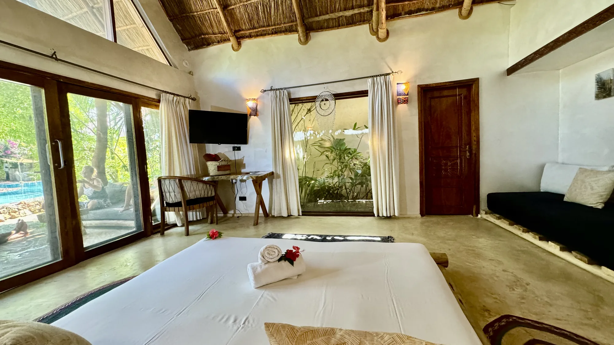 Bedroom opening onto the tropical garden