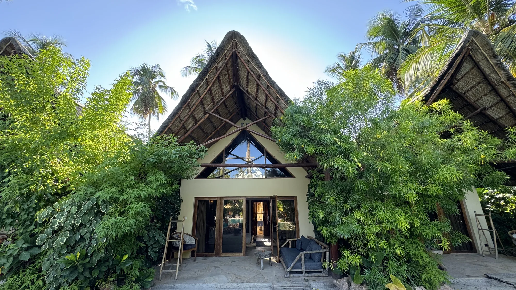 A-frame villa at The Nest nestled in the greenery, built by hand with palm and wood