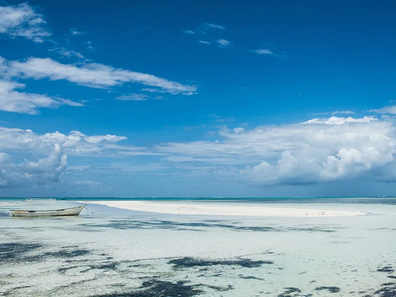 Turquoise lagoon and sandbank at Paje at low tide
